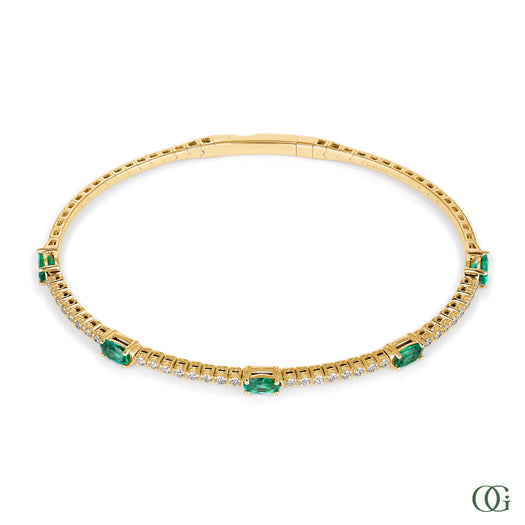 Y | diamond bangle with emerald accents in 14K yellow gold