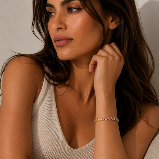 Y | Woman sit with rainbow bracelet