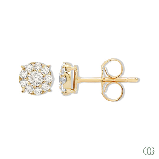 A pair of dainty round diamond earrings with a gold band and a clear, encrusted in diamonds design.