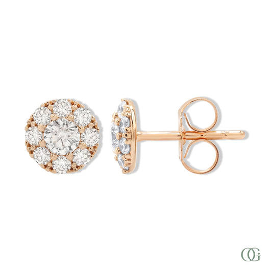 Rose gold earrings with diamond accents on a white background