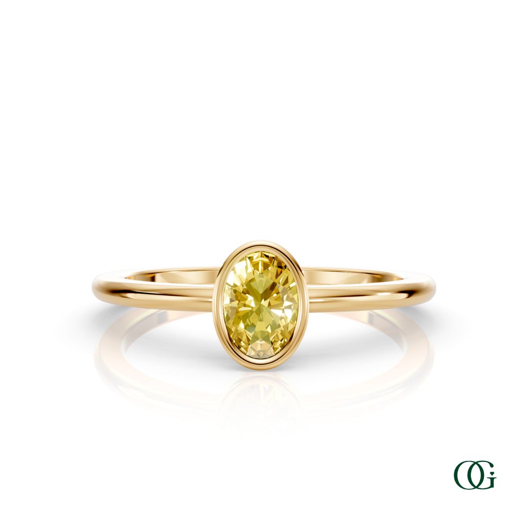 Y| A yellow gold ring featuring an oval citrine birthstone for November