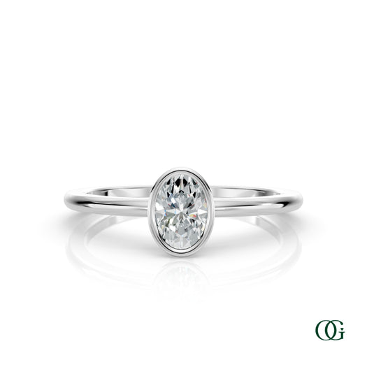 W| A white gold ring featuring an oval diamond birthstone for April