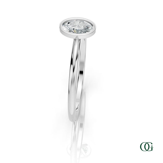W| A white gold ring featuring an oval diamond birthstone for April