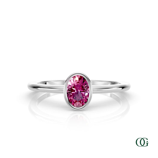 W| A white gold ring featuring an oval tourmaline birthstone for October