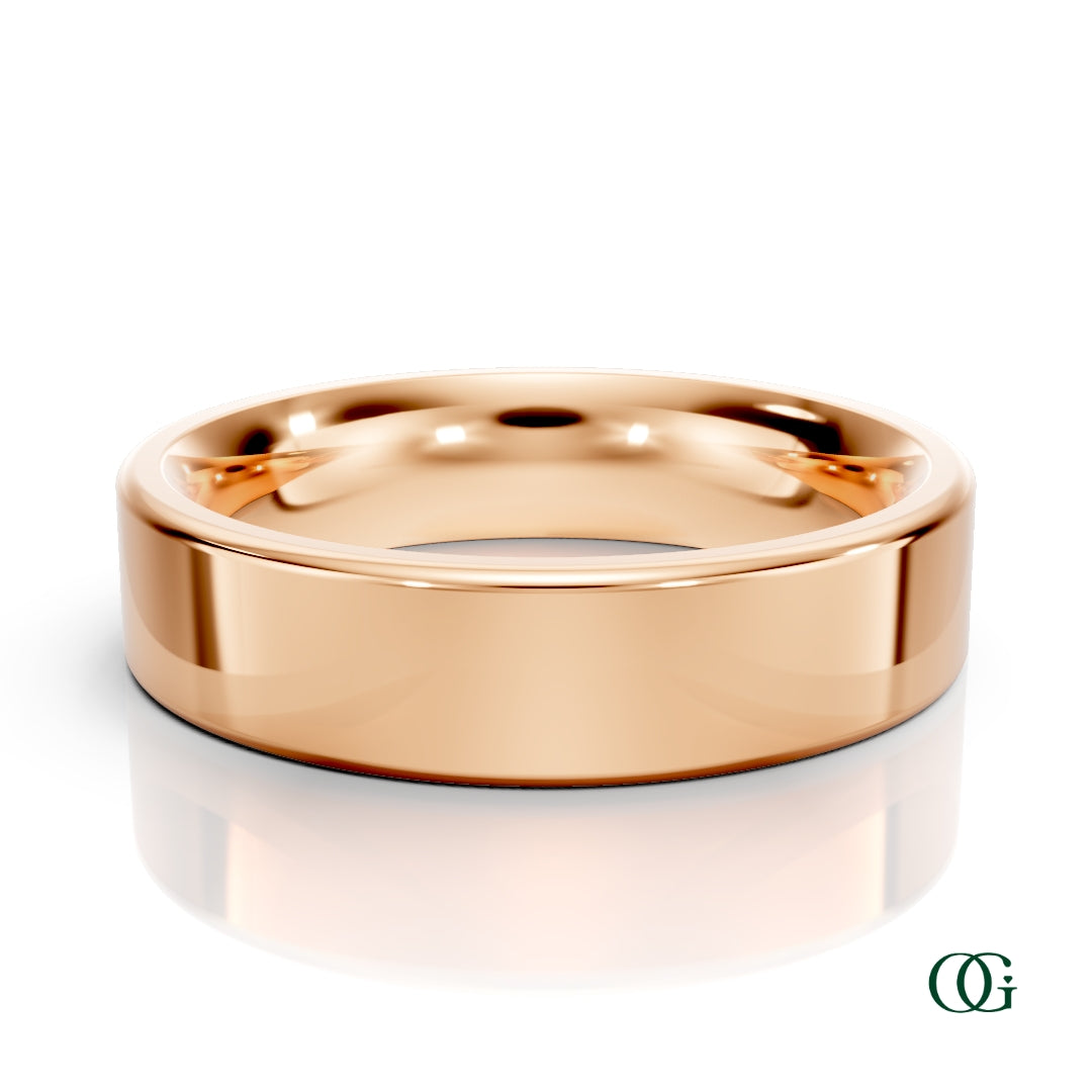R | A polished rose gold wedding men's band ring with a smooth, rounded profile, displayed on a clean white background with a soft reflection below. 