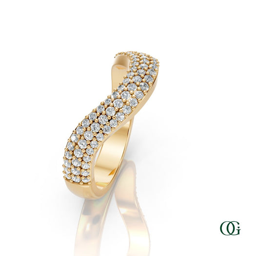 Y | A curved yellow gold ring featuring three rows of round-cut diamonds