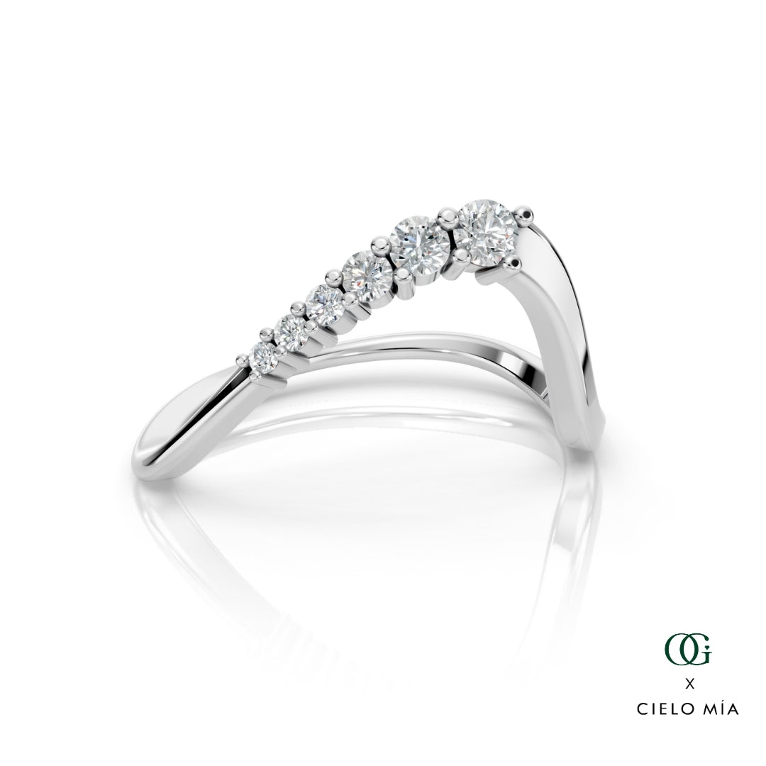 W | White gold ring with diamonds on a white background