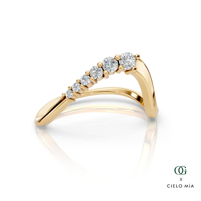 Y | Gold ring with diamonds on a white background