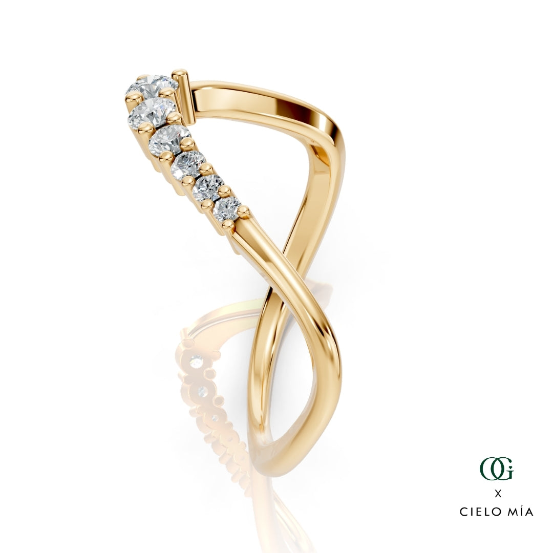 Y | Gold ring with diamonds on a white background