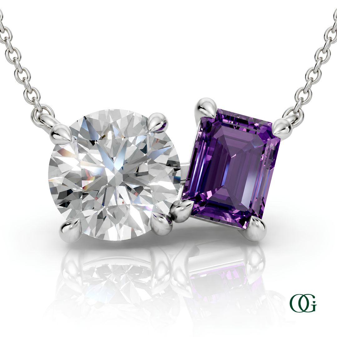 W | white gold necklace with two stones: a round diamond center stone and an  emerald-cut amethyst side stone.