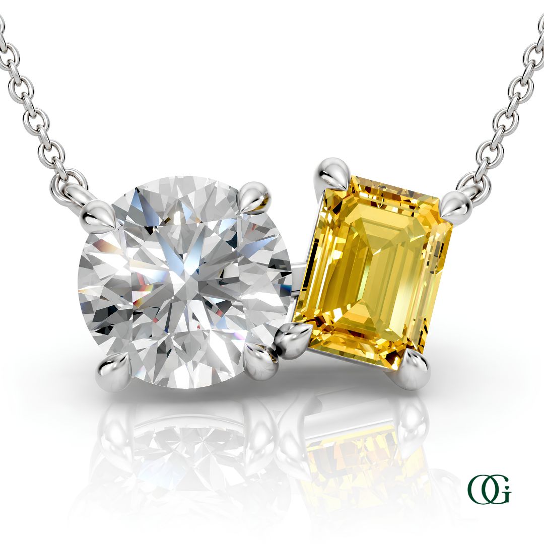 W | white gold necklace with two stones: a round diamond center stone and an  emerald-cut citrine side stone.