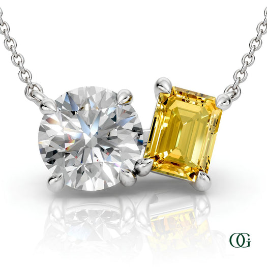 W | white gold necklace with two stones: a round diamond center stone and an  emerald-cut citrine side stone.