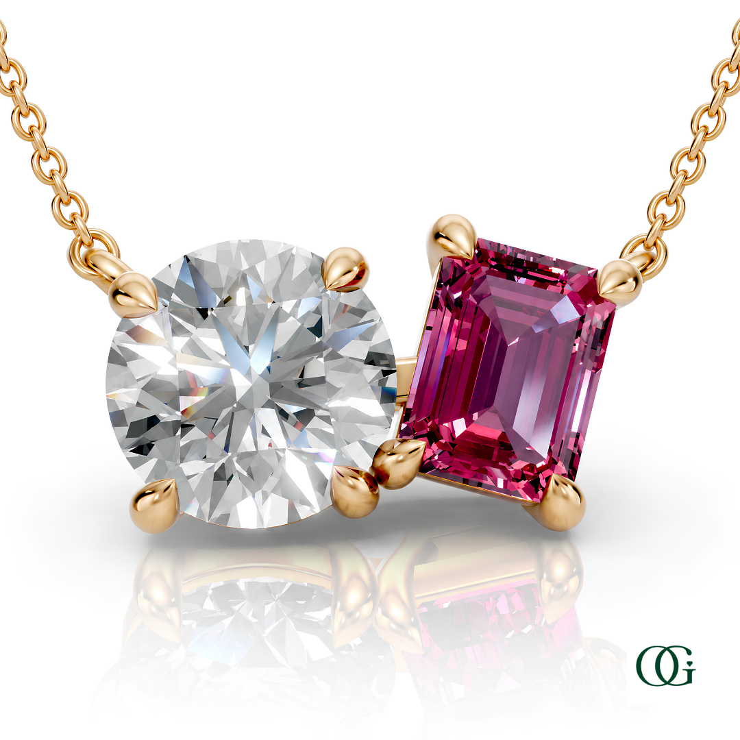 Y | gold necklace with two stones: a round diamond center stone and an  emerald-cut tourmaline side stone.