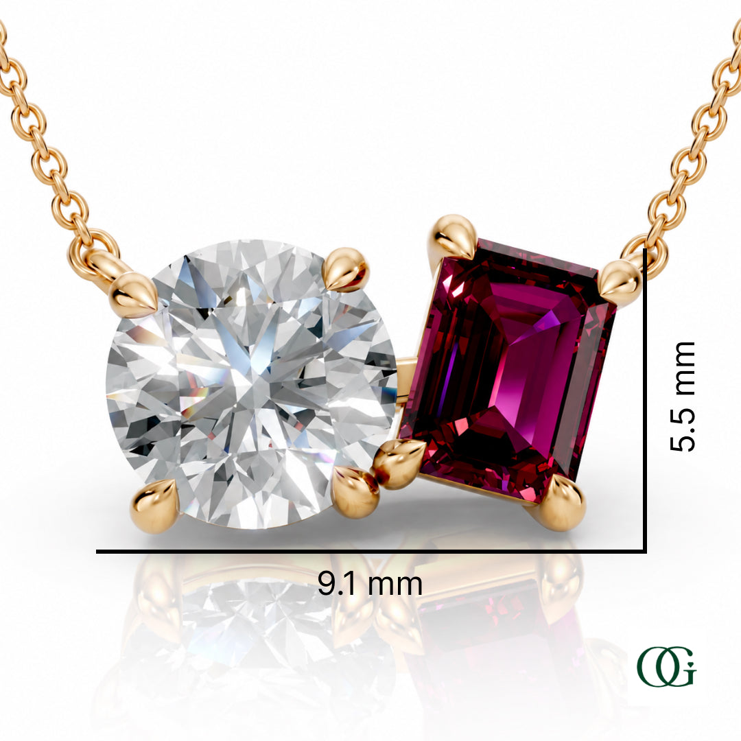 Y | gold necklace with two stones: a round diamond center stone and an  emerald-cut garnet side stone.